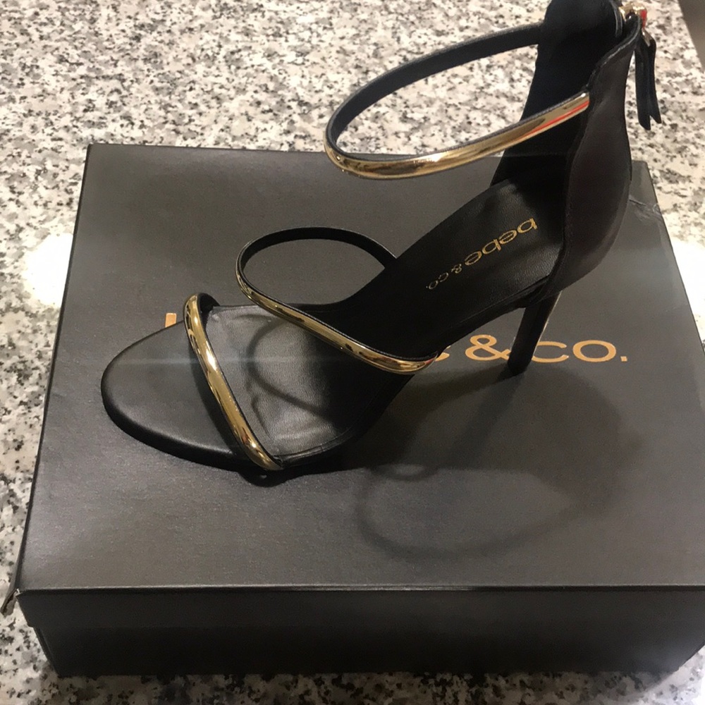Bebe Shoes. Three gold stripes for a queen!